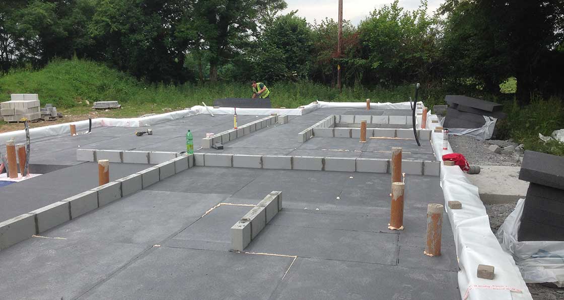 Raft foundation insulated with 250mm Kore Insulation, and 215mm Quinn Lite blocks to perimeter and rising walls