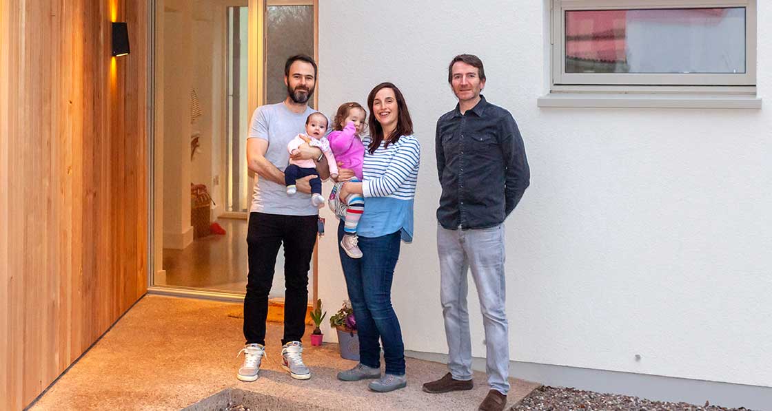 Happy homeowners Oliver Long, Aisling Buckley & family with architect Neil Kane