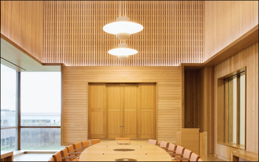 The main board room is one of the few parts of the building that is artificially ventilated, and is strikingly fitted out with FSC certified American Ash