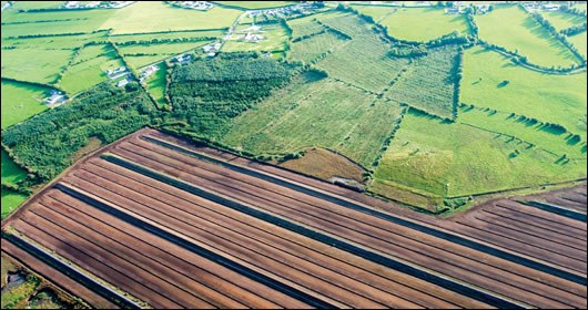 An aerial view of a bog harvested by Bord na Móna in the Bog of Allen, County Kildare