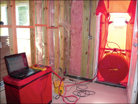 blower door tests are carried out at various stages of construction as air-tightness is the hallmark of a Super E home