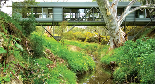 Fitting with the landscape is an often-overlooked part of green building, but the Bridge House does it beautifully