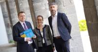 Minister for Housing James Browne TD, Marion Jammet, Head of Policy and Advocacy at the Irish Green Building Council, and Kieran Holohan, Managing Director of Saint-Gobain Ireland.