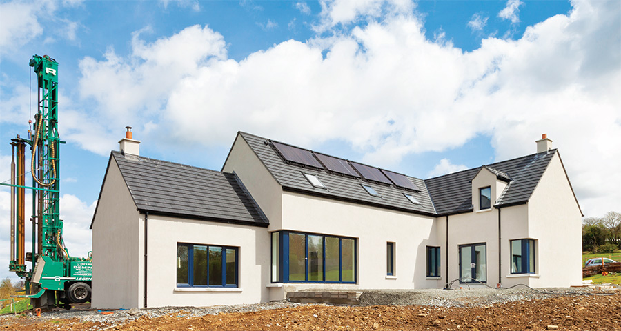 The front facade of the house incorporates a fairly traditional design, though the rear is more contemporary in appearance