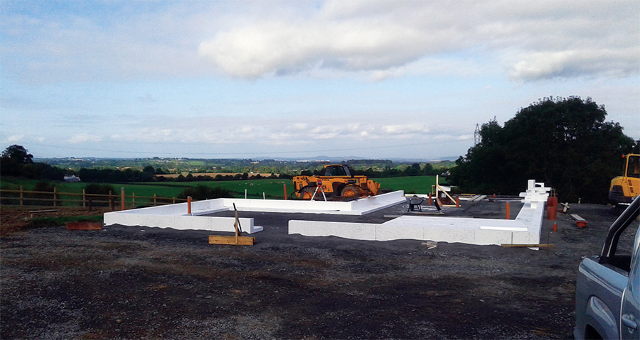 The house features a Viking House passive slab insulated foundation system