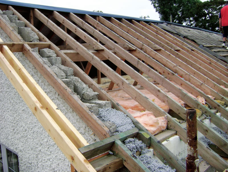 the old roof tiles were stripped off, and replaced with new clay tiles over a Siga Majcoat wind-tight membrane