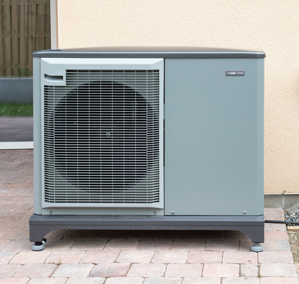 Heating and hot water are provided by an air-to-water heat pump system in each house, which consists of a NIBE F2040 outdoor unit (above) that converts heat from the air outside, and a VVM320 indoor unit (top) that distributes this heat in the most efficient way. A Brink heat recovery ventilation unit (top, attached to ceiling) will provide fresh air to the homes and should ensure high indoor air quality for the occupants