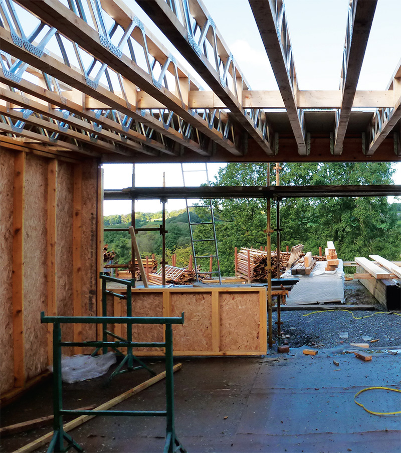 the windows were installed proud of the main timber frame, to form a complete insulation layer once cellulose is added