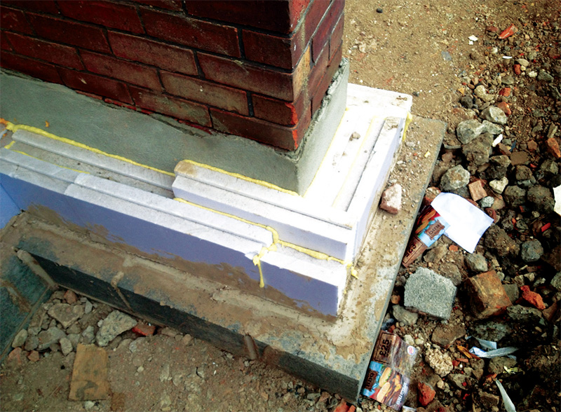 The careful application of external insulation begins