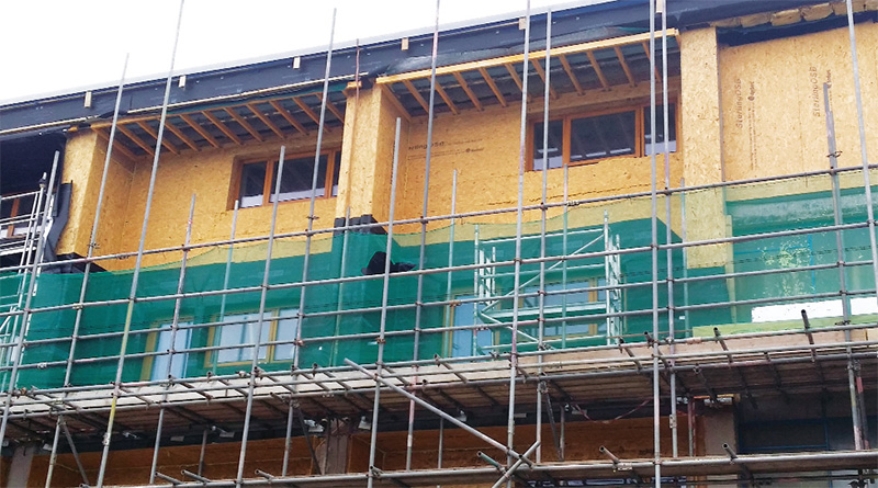 Insulated timber panels were used to cover much of the building’s façade