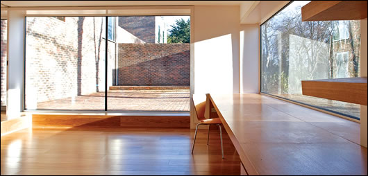 Underfloor heating fed by a geothermal heat pump lies discreetly beneath a high-spec timber floor