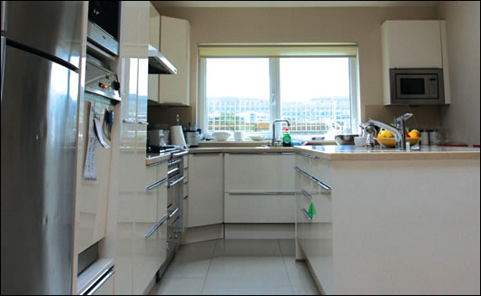 The old garage was knocked to make way for a new extension, which houses the spacious new kitchen and dining room