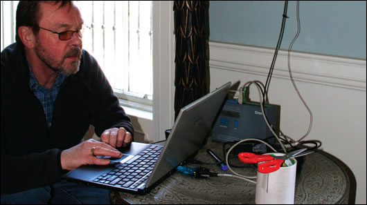 Dr Paul Baker setting up heat flux monitor and data logger in 10 North Great Georges Street