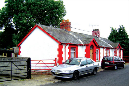 The walls are lime-rendered to the street-facing north