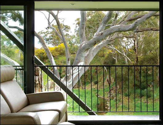 Max Pritchard's Bridge House spans a creek outside Adelaide, Australia