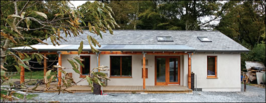 The porch is protected by a galvanised steel roof, which provides shading for the south-facing façade in summer. Woolley says galvanised steel is more environmentally friendly than powder-coated steel