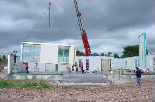 The turnkey timber frame home, supplied by Hanse Haus, comes together in sections