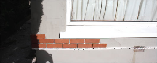 The brick slip finish by Homeglo being applied to the newly insulated walls on the ground floor